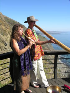 pic of Elaina and Bob playing instruments at a wedding